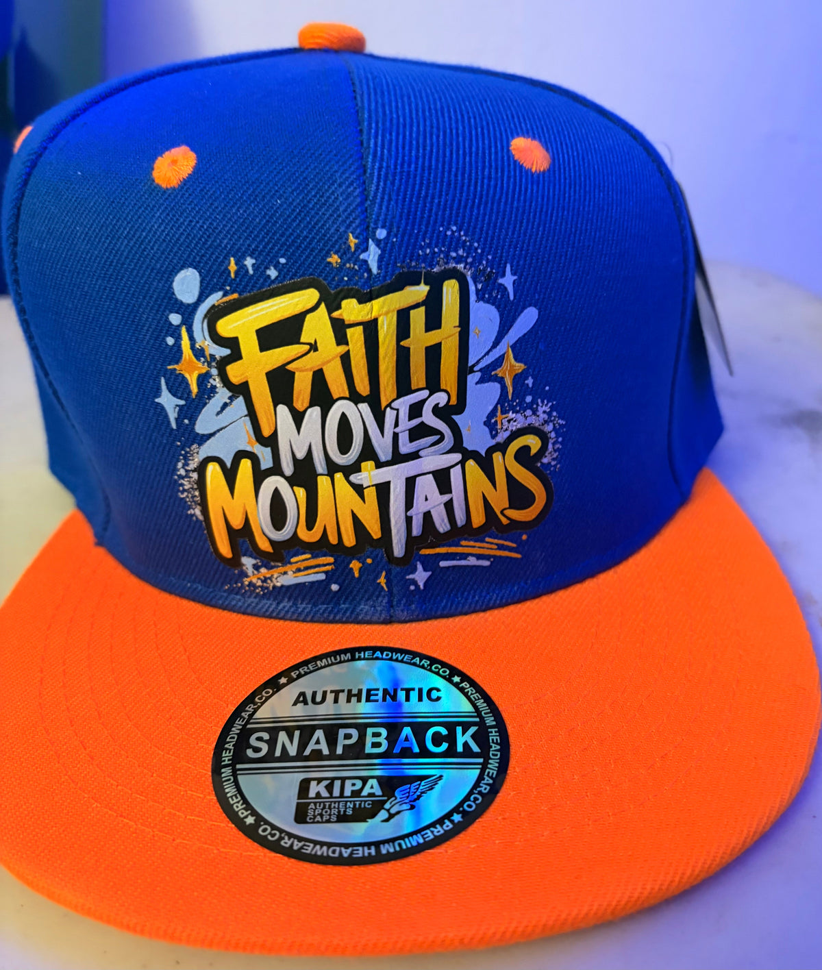Faith Moves Mountains royal blue and orange custom snapback hat